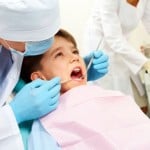 dentist working on a child patient